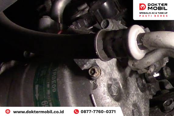 Kompresor AC Bau Gosong di Mobil